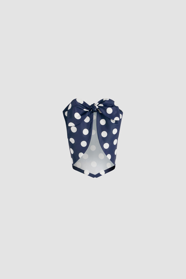 Patou - Top noué en ottoman imprimé recyclé - Navy Polka Dots - Top en ottoman recyclé. Imprimé pois. Coupe courte. Col rond. Dos fendu avec fermeture par nœud. Ourlet à découpe en V.