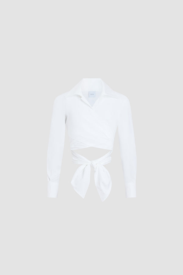 Patou - Organic Cotton Long Sleeve Knotted Top - White - White long sleeve top. Organic cotton material. V-neck. Knot at the back.