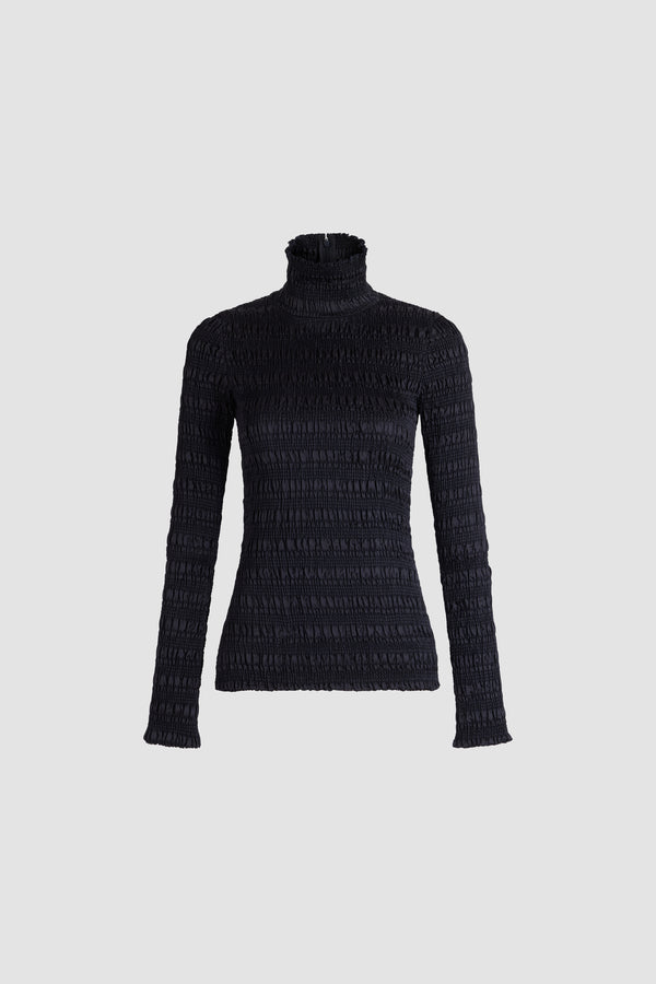 Patou - Top mit Stehkragen und Smok-Details aus Viskose - Polar Night - Marineblaues Top aus Viskose. Smokstruktur. Stehkragen. Lange Ärmel. Figurbetonte Silhouette. Körpernahe Passform.