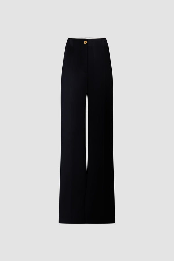 Patou - Pantalon long iconique en coton bio - Night Blue - Pantalon long iconique bleu marine. Coupe droite. Taille haute. Fermeture boutonnée dorée.