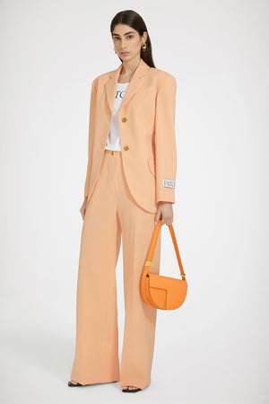 Iconic long trousers in technical wool