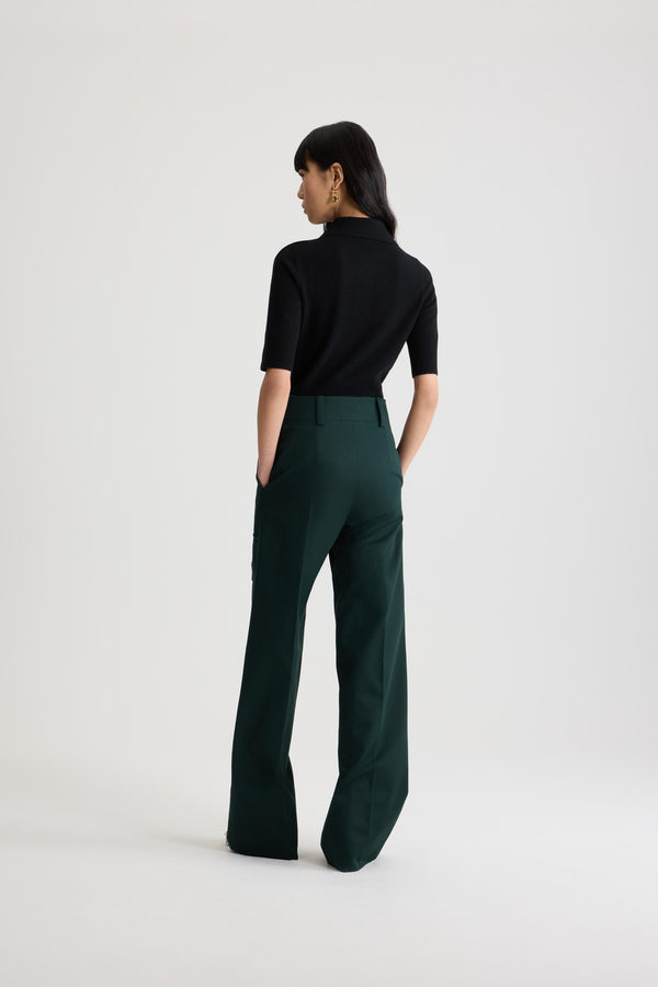Patou - Flared cargo trousers in organic cotton gabardine - Garden Green - Garden Green organic cotton gabardine trousers. Long flared leg. Gold-tone JP monogram-engraved button and concealed zip at the front. Belt loops. Pockets at the sides; cargo pockets on the legs with gold-tone JP monogram-engraved snap buttons. Stitched crease at the front and back.