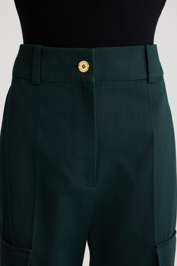 Patou - Flared cargo trousers in organic cotton gabardine - Garden Green - Garden Green organic cotton gabardine trousers. Long flared leg. Gold-tone JP monogram-engraved button and concealed zip at the front. Belt loops. Pockets at the sides; cargo pockets on the legs with gold-tone JP monogram-engraved snap buttons. Stitched crease at the front and back.