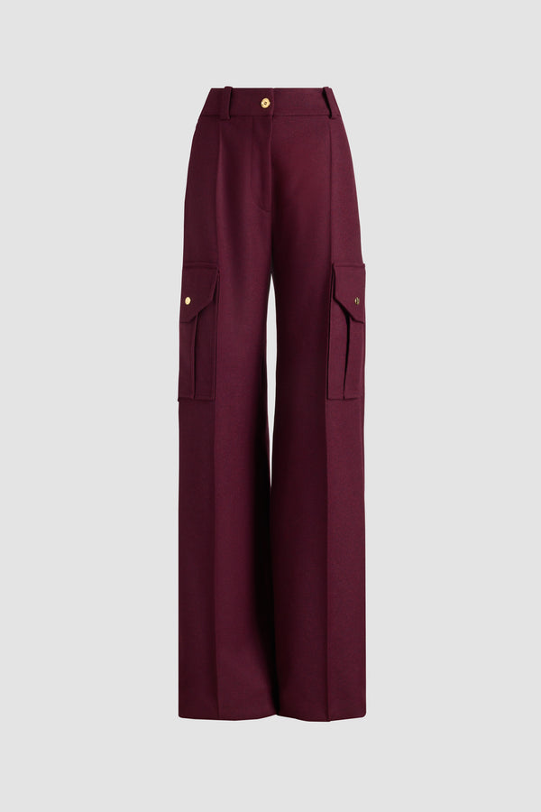 Patou - Flared cargo trousers in recycled wool blend flannel - Syrah - Syrah burgundy recycled wool blend flannel trousers. Long flared leg. Gold-tone JP monogram-engraved button and concealed zip at the front. Belt loops. Pockets at the sides; cargo pockets on the legs with gold-tone JP monogram-engraved snap buttons. Stitched crease at the front and back.