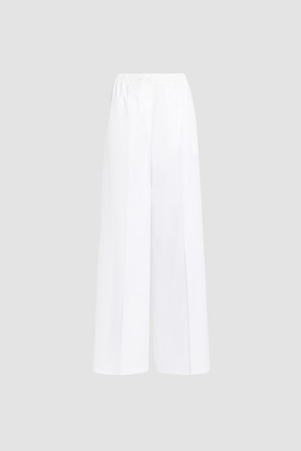 Patou - Pantalon à taille élastique en coton bio - White - Pantalon à taille élastique en coton bio, de couleur blanche. Taille élastique. Jambes larges.