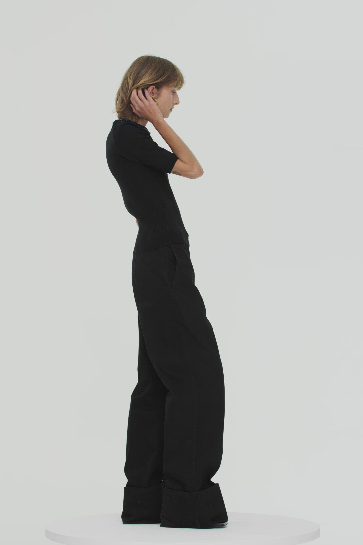 Patou - Embellished short-sleeved jumper - Black - A precious pearl proposition for theclassic knit.Black jumper. Short-sleeved style. Jewelled neckline. Button fastening at the back.