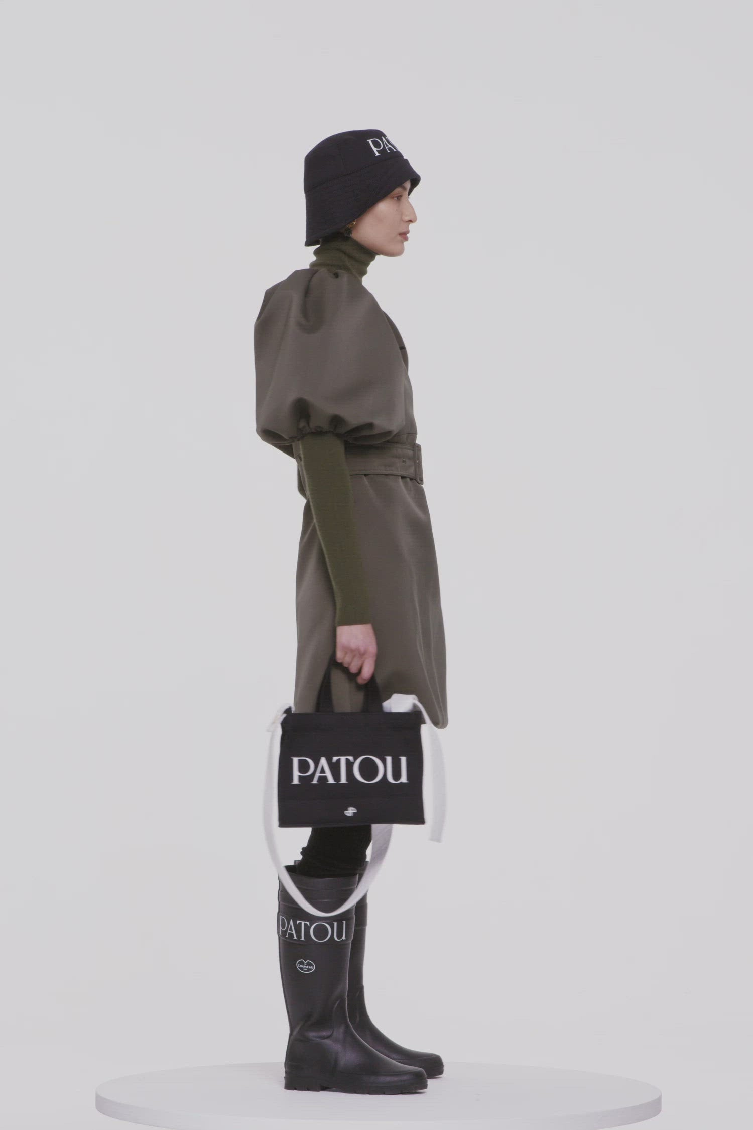 Patou - Balloon sleeve mini dress in recycled satin - Khaki - Sculpted sleeves for daytime. Khaki recycled satin dress. Short hemline. Fit and flare silhouette. Square neckline with drawstring detail. High-volume balloon sleeves with elasticated cuffs. Pockets at the sides. Sold without the belt.