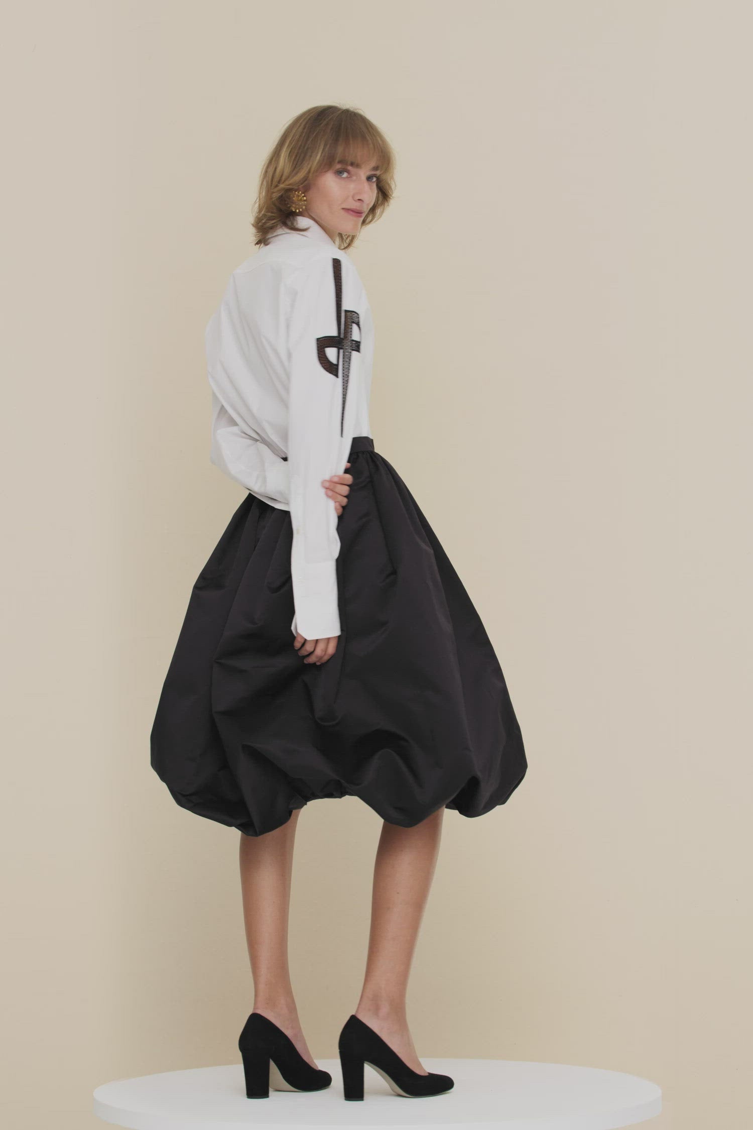 Patou - Embroidered logo shirt in organic cotton - White - JPs and embroideries: modern Patou signatures.White organic cotton shirt with contrasting embroideries. Spread collar. Concealed button fastening; buttoned cuffs. Side vents. Stylised JP logo embroidered in black on both sleeves; black Patou logo on the left cuff.