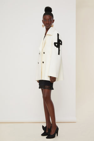 Jewelled logo peacoat