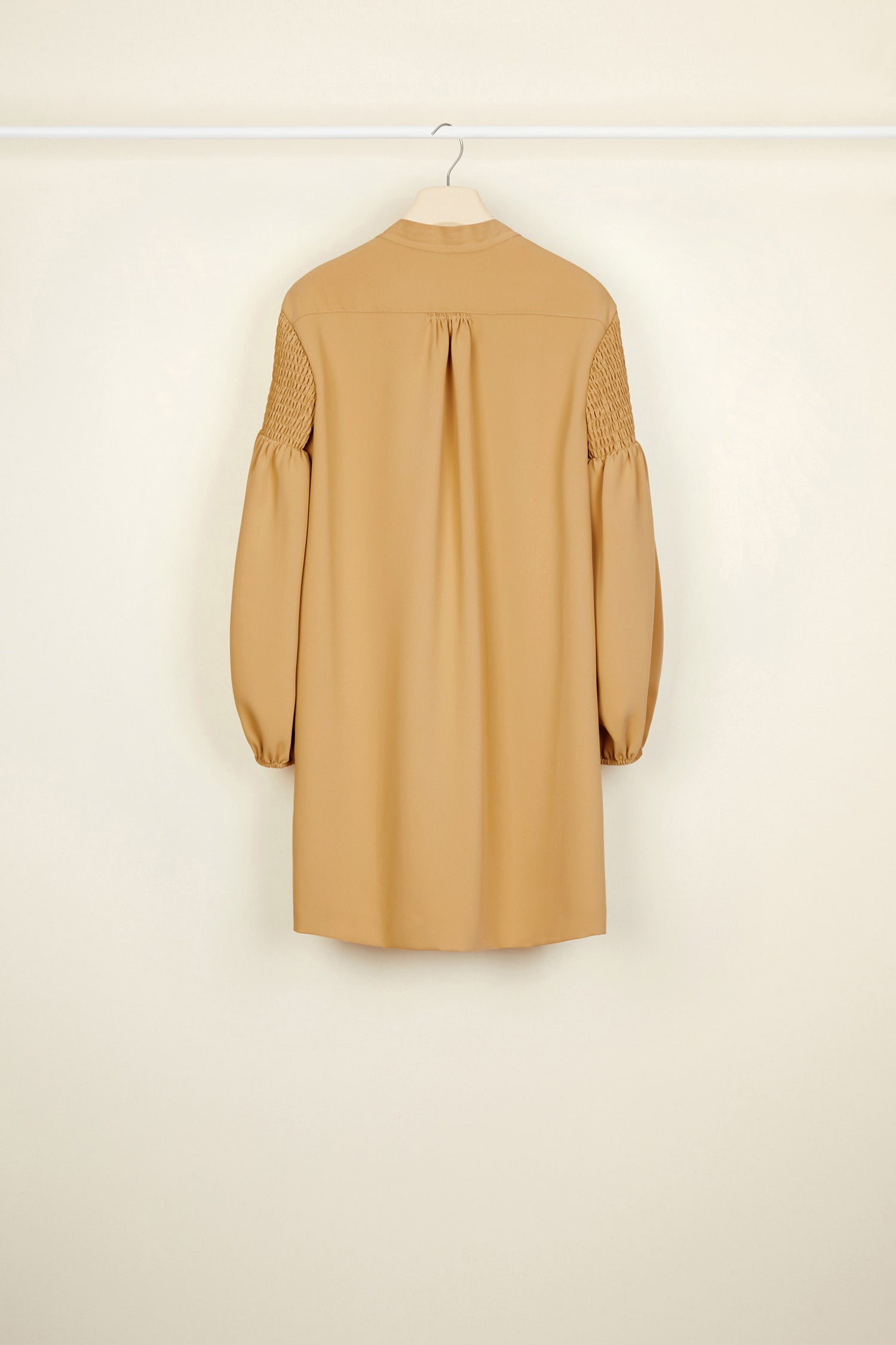 Patou - Lace bib dress - Sand - The day dress is best worn with a touch of lace.Sand-coloured cady dress with white lace bib. Mother-of-pearl buttons down the front. Long sleeves, smocked at the top with elasticated cuffs. Pockets at the sides.