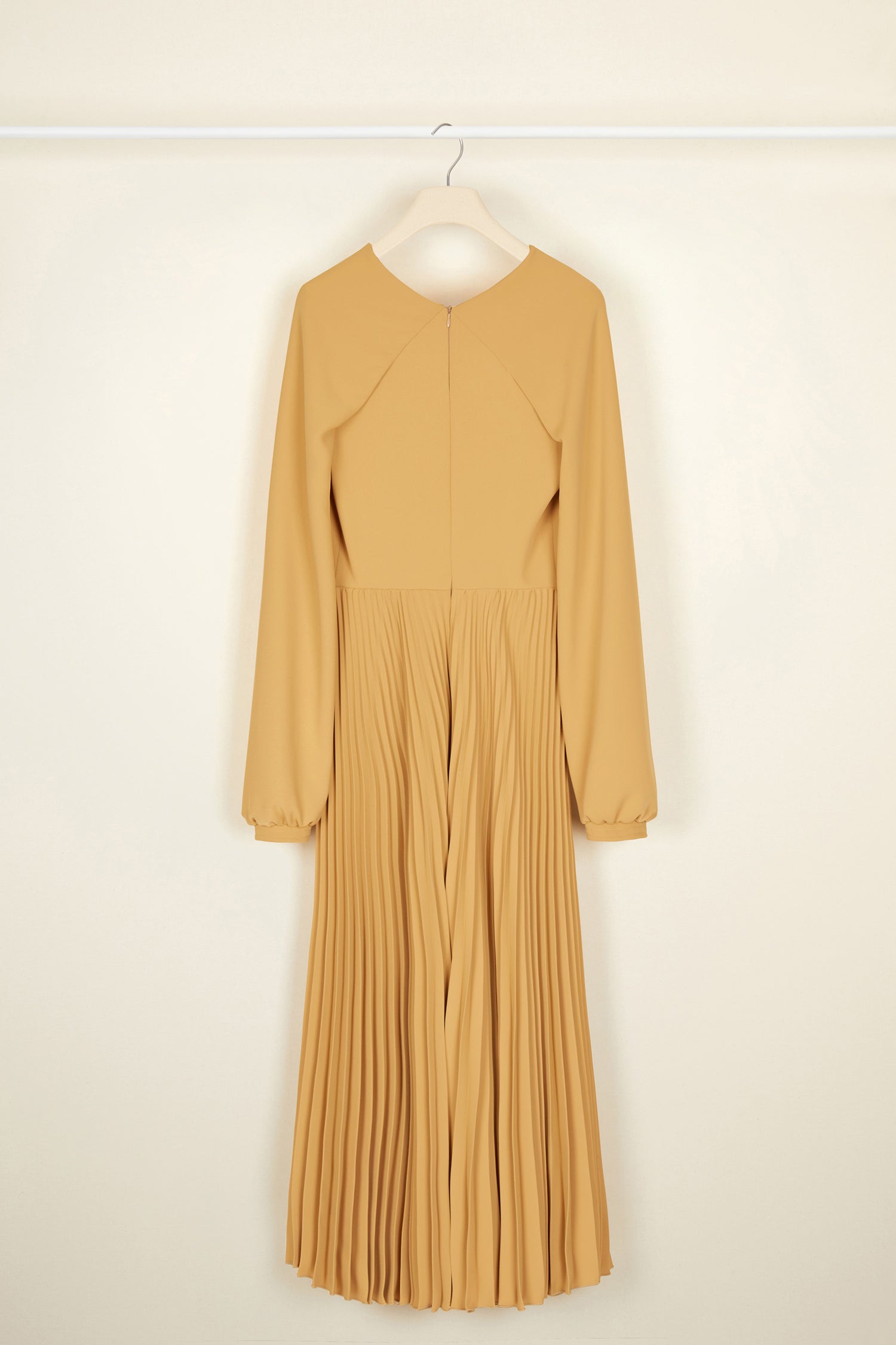 Patou - Twisted neckline pleated midi dress - Sand - Twisting and pleating. Sand-coloured cady midi dress. Long sleeves twisted at the collar over a V neckline. Zip fastening at the back. Ruched detailing at the front. Mother-of-pearl buttons at the cuffs. Pleated skirt.