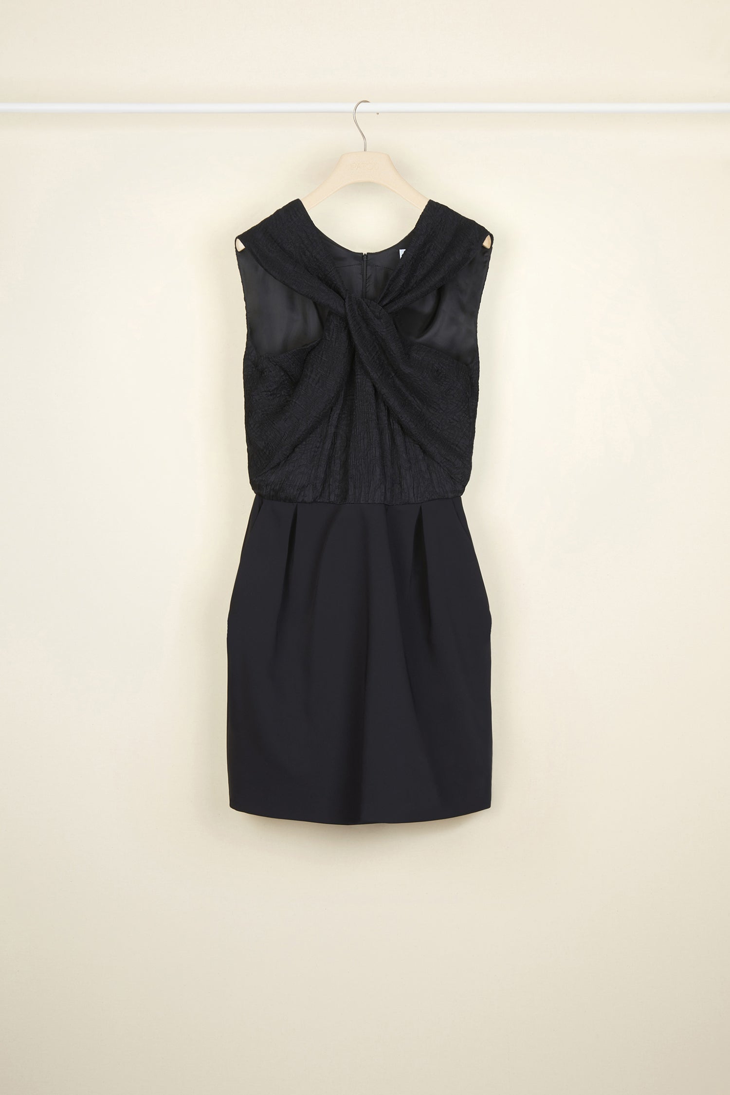 Patou - Twist front minidress - Black - Artfully twisted.Black minidress featuring a cloqué top. Twisted neckline at the front, zip fastening at the back. Cady skirt with box pleats at the front. Two pockets at the sides. Lined.