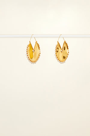 Circular brass and pearl earrings