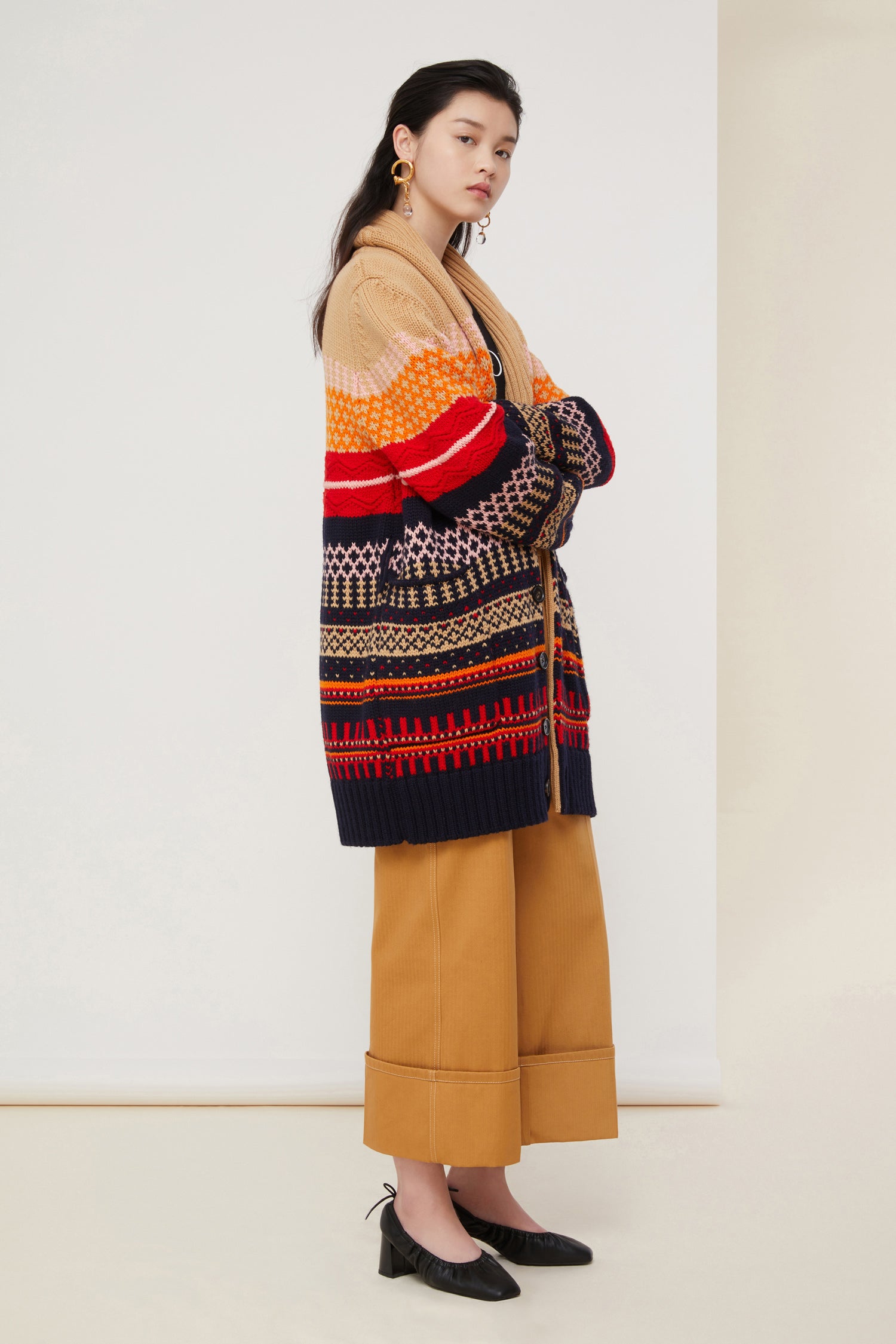 Patou - Oversized jacquard cardigan - Multicolor - Cosy yet bold: the new cardigan.Oversized jacquard wool cardigan in Act 4’s colour palette. Shawl collar. Button fastening at the front with a belt at the waist. Two pockets with a Patou label on one side.