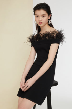 Robe en maille à plumes
