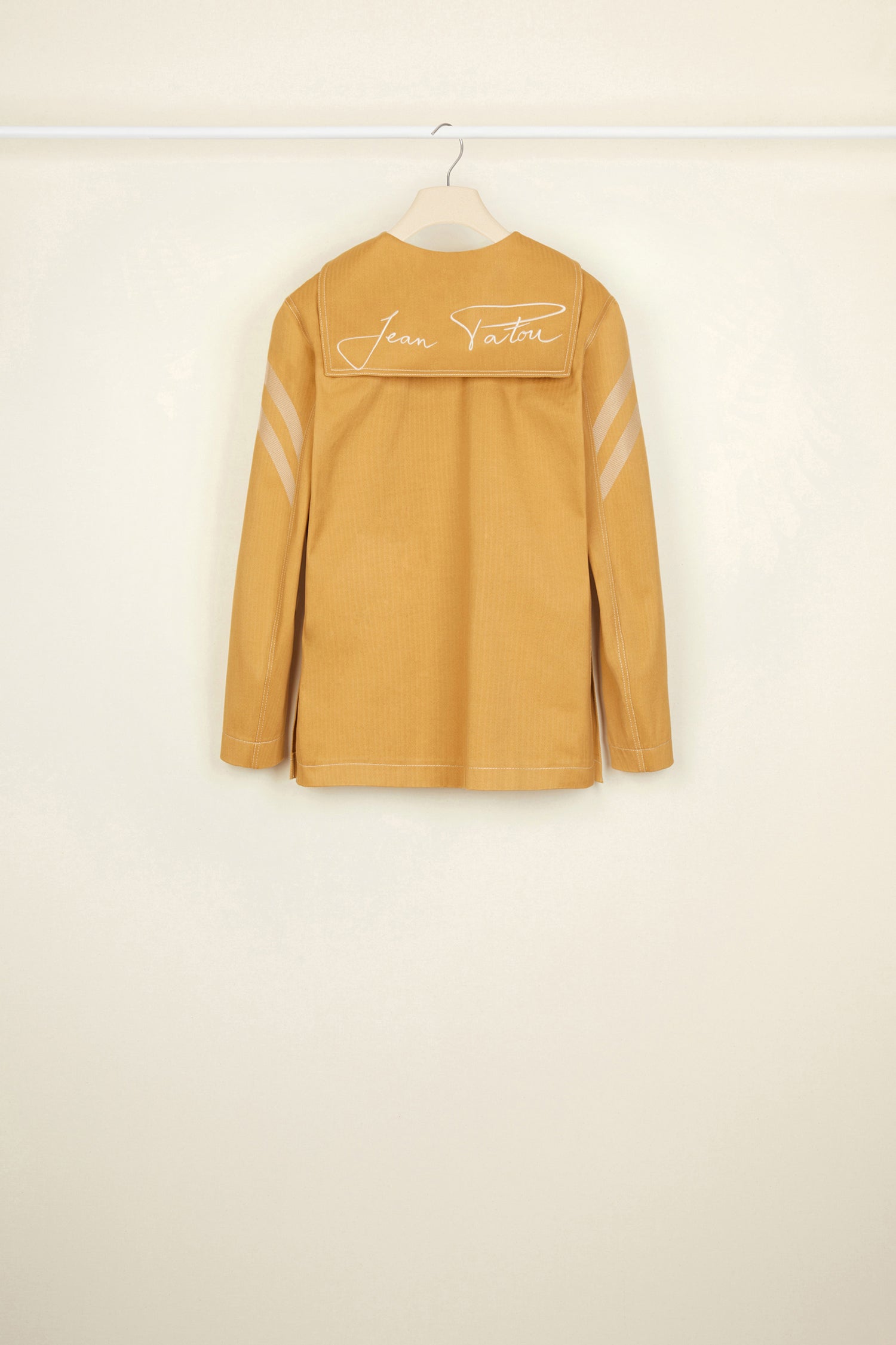 Patou - Herringbone cotton sailor tunic - Copper - A strong silhouette comes alive with a distinctive pattern.Copper-hued heavy herringbone cotton tunic. Sailor-style collar with a deep V neckline and non-removable button tab at the front; signature flap at the back with embroidered Jean Patou signature. Flared silhouette with side slits. Contrast stitching all over.