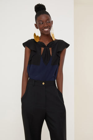 Top in seta bicolore