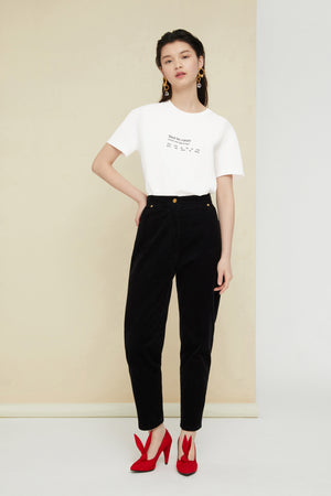 Pantalone carrot in velluto a costine