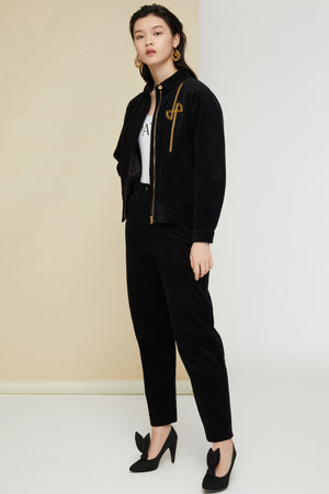Pantalone carrot in velluto a costine
