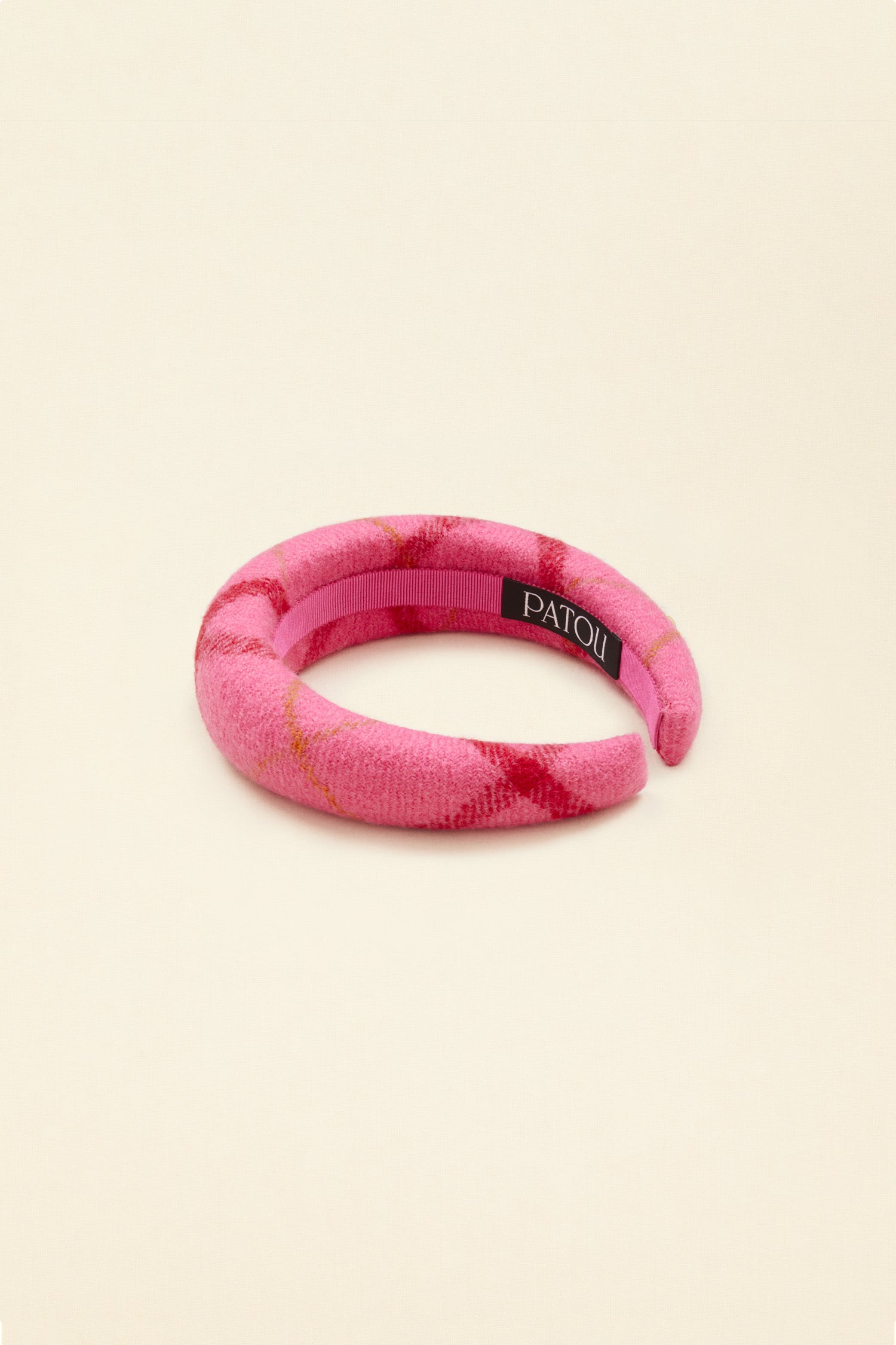 Patou - Padded headband in checked wool - Pink Checkerboard - A bright wool crown fit for modern-day royalty.Virgin wool headband featuring a Pink Checkerboard pattern. Thick padded style. Gold-coloured JP logo. Grosgrain-lined underside with embroidered Patou label.