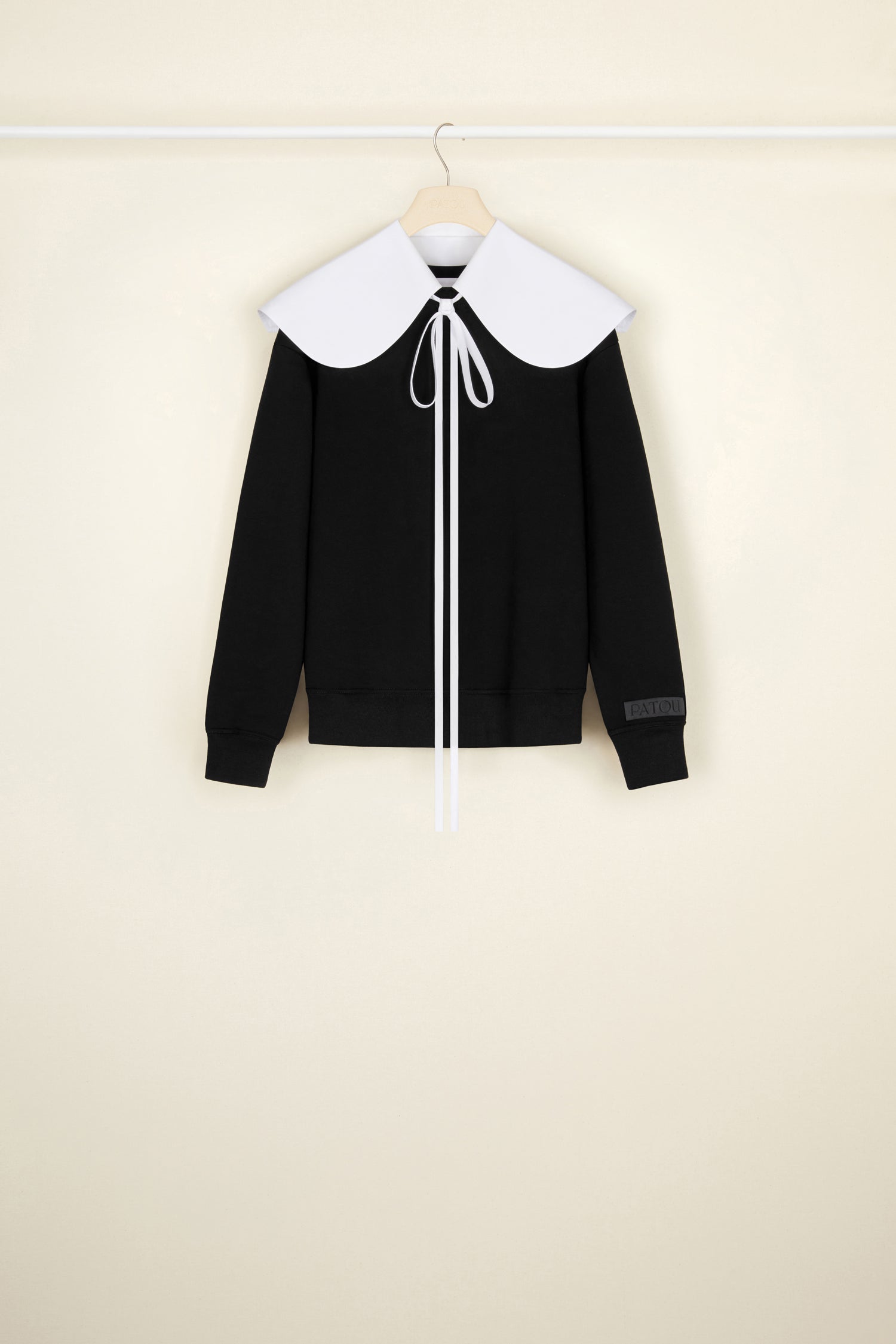 Patou - Organic cotton sweatshirt with a detachable collar - Black - A poplin collar, a Patou signature that makes everything chicer.Black organic cotton sweatshirt. Removable organic cotton poplin collar that fastens via long ties at the front. Embroidered Patou label on the left sleeve.