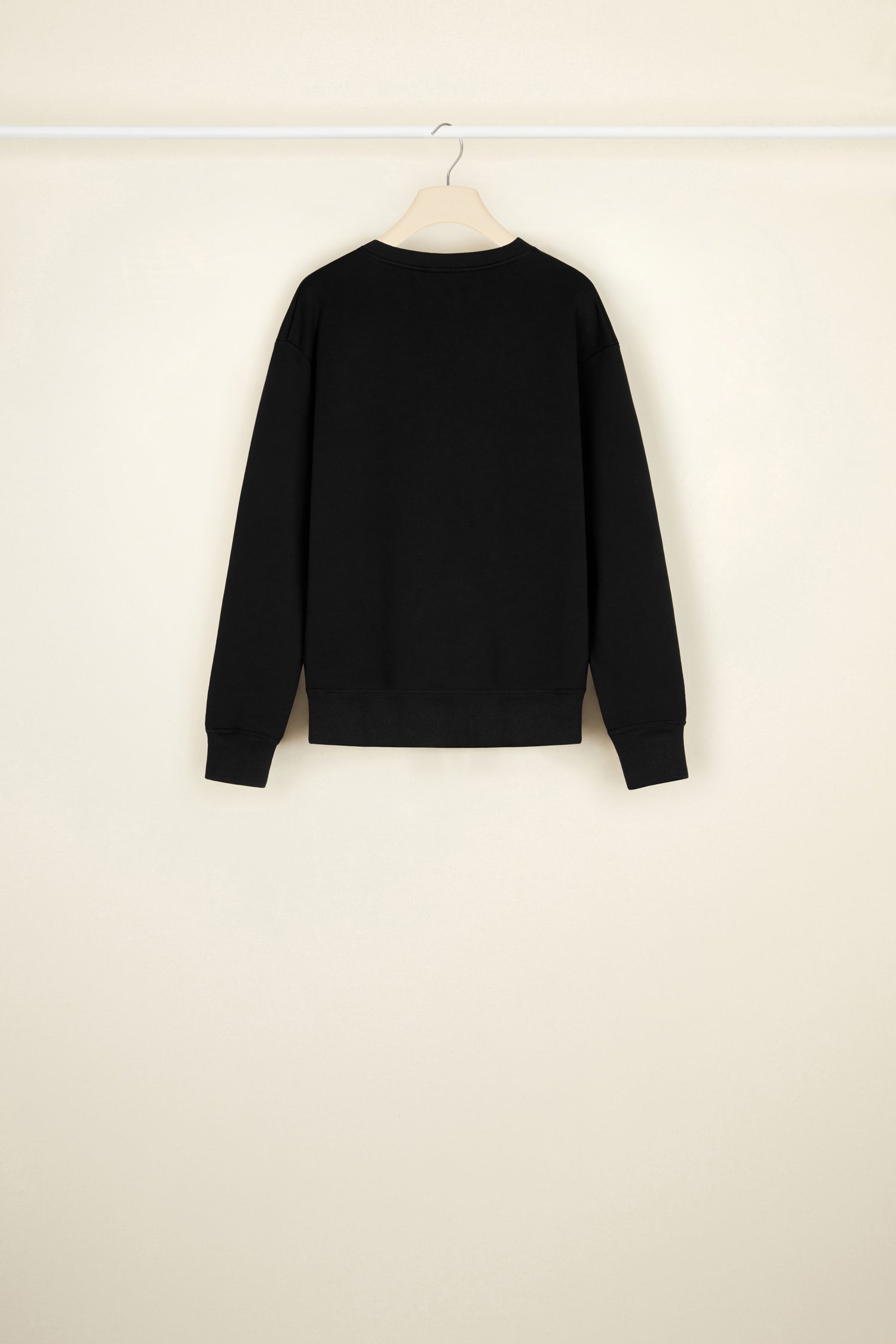 Patou - Organic cotton sweatshirt with a detachable collar - Black - A poplin collar, a Patou signature that makes everything chicer.Black organic cotton sweatshirt. Removable organic cotton poplin collar that fastens via long ties at the front. Embroidered Patou label on the left sleeve.