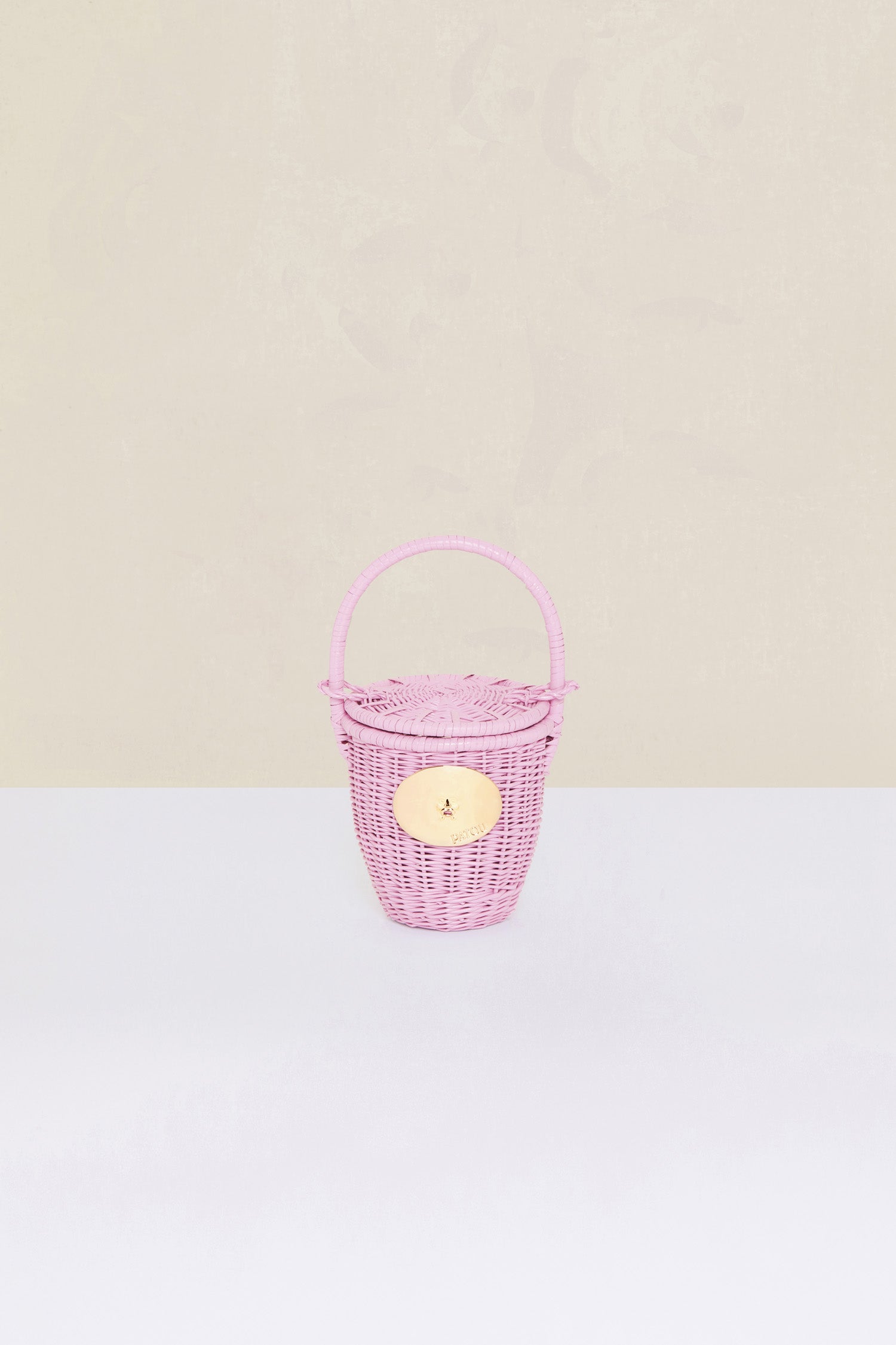 Patou - Wicker bucket bag - Lilac - Soon to be on everyone&amp;#39;s lips...Lilac wicker bucket bag. Top handle with a sliding lid. Gold-coloured embellishment inspired by the &amp;quot;Bocca della Verità.&amp;quot;This bag is handmade and may have some irregularities.