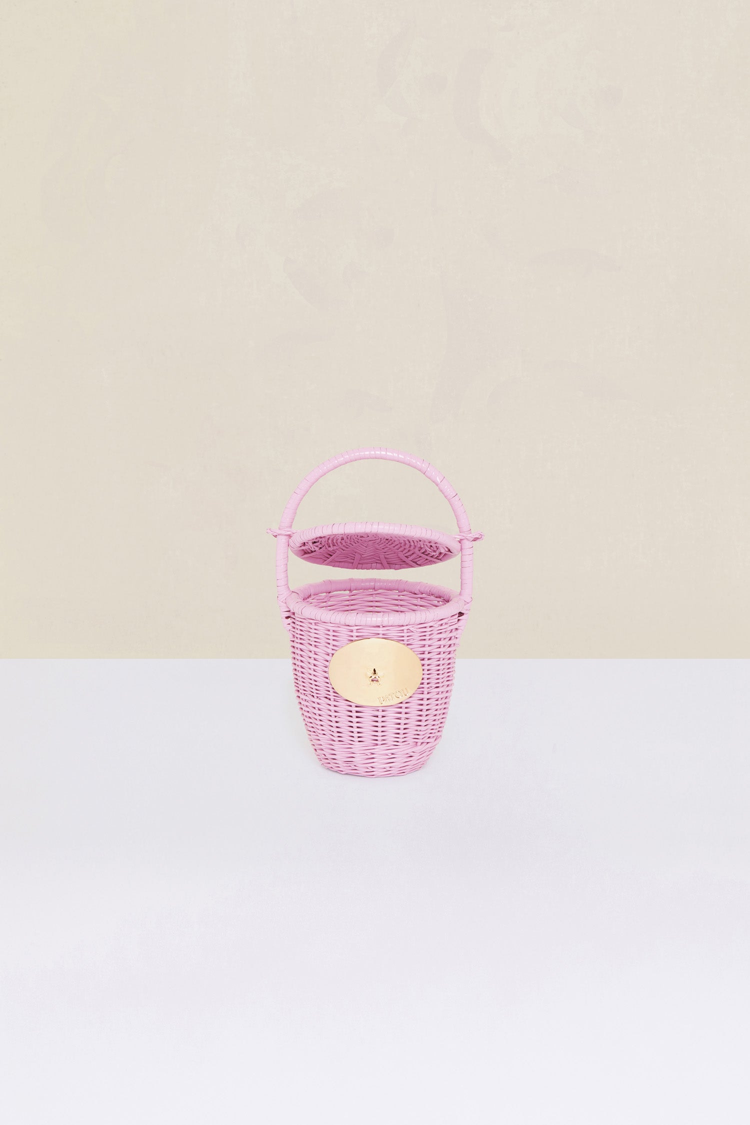Patou - Wicker bucket bag - Lilac - Soon to be on everyone&amp;#39;s lips...Lilac wicker bucket bag. Top handle with a sliding lid. Gold-coloured embellishment inspired by the &amp;quot;Bocca della Verità.&amp;quot;This bag is handmade and may have some irregularities.