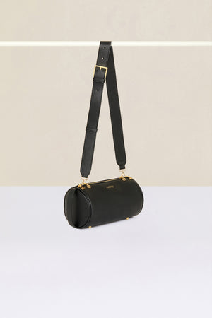 Barrel bag in faux leather