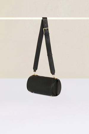 Barrel bag in faux leather