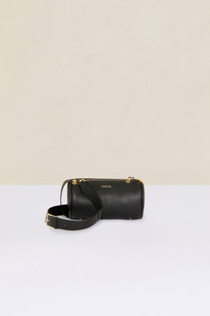 Barrel bag in faux leather