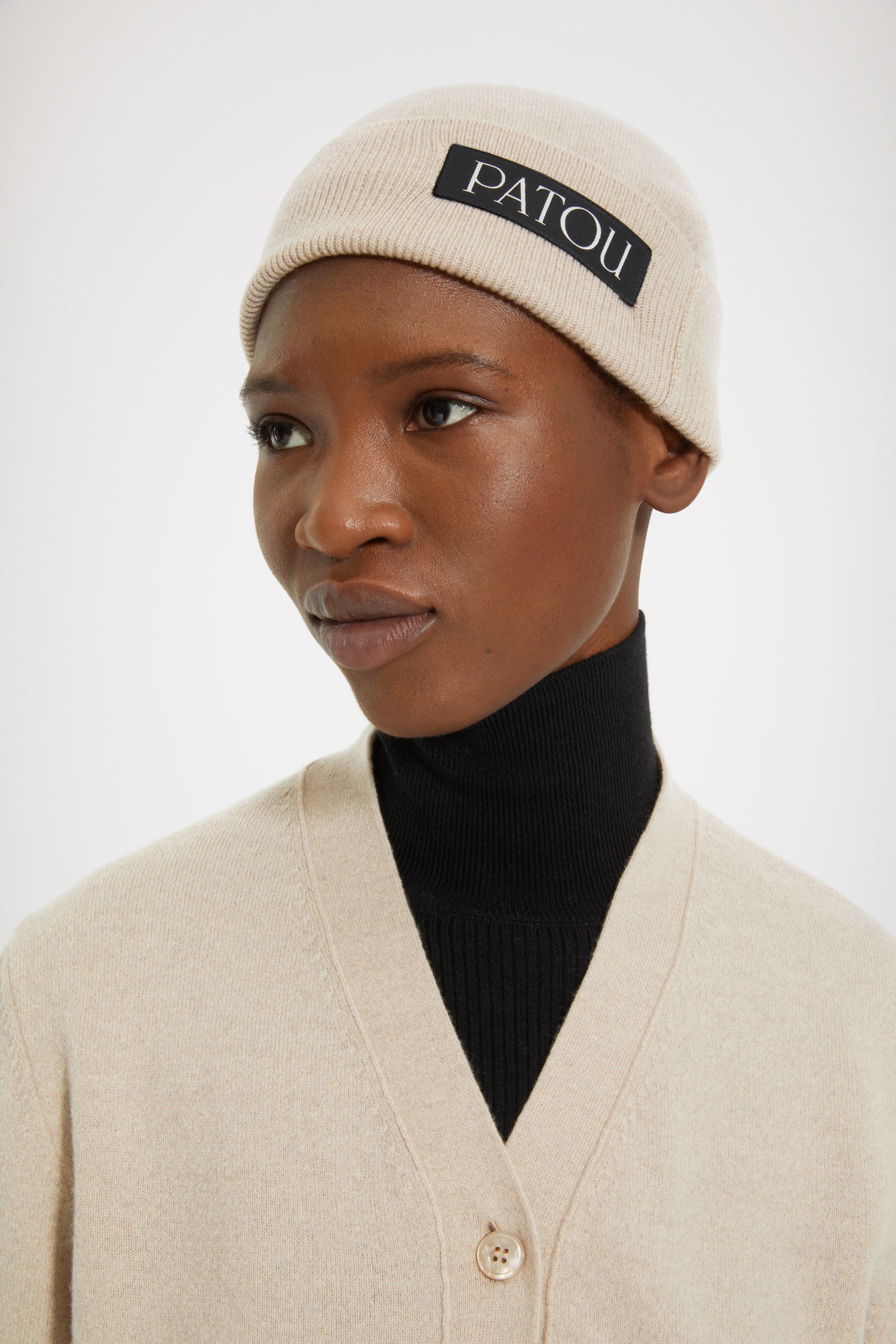Patou - Fragrance wool beanie - Biscuit - The scent of an icon.Biscuit beige wool beanie. Perfume bottle intarsia inspired by the Jean Patou archive.
