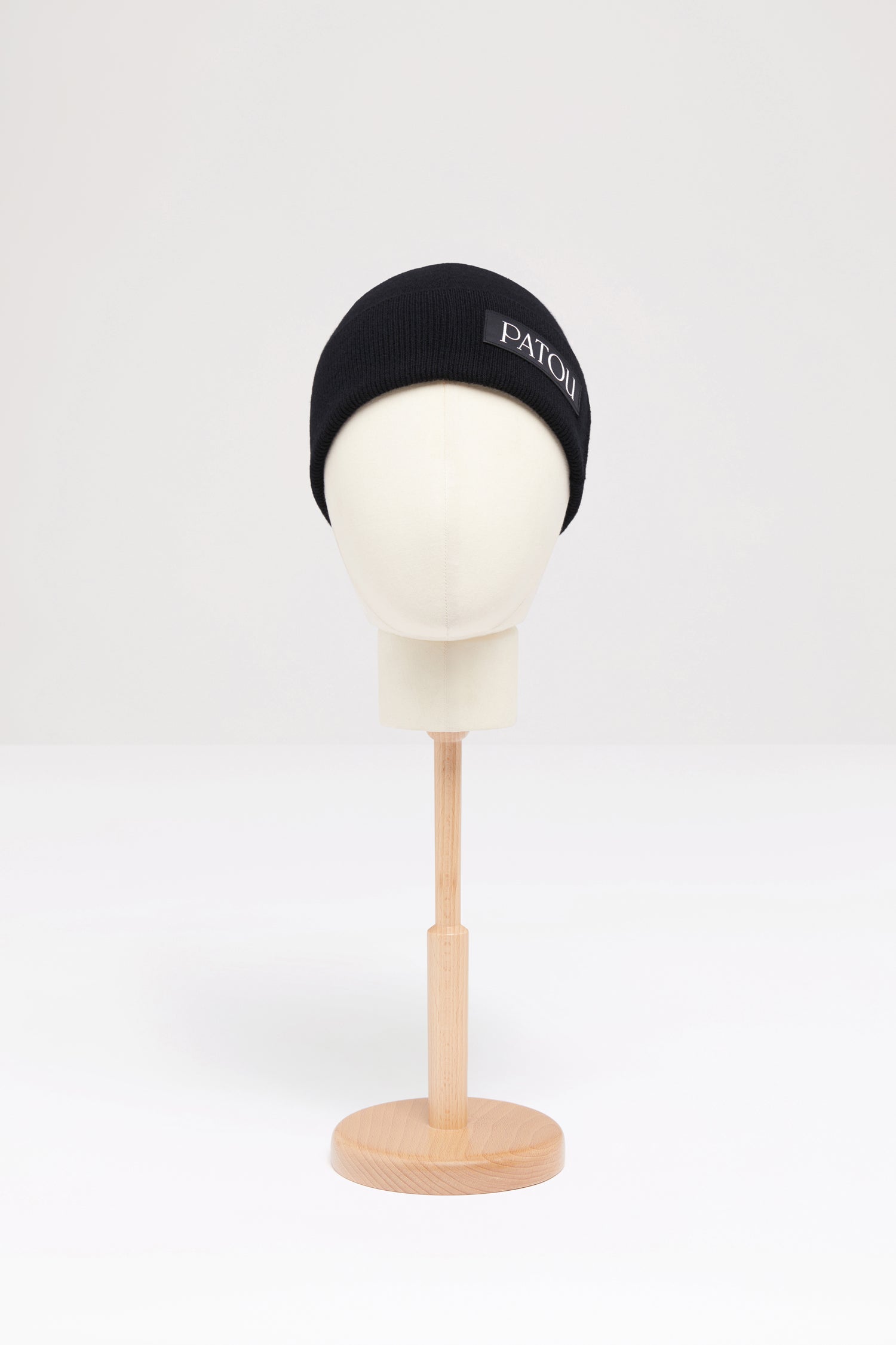Patou - Fragrance wool beanie - Black - The scent of an icon.Black wool beanie. Perfume bottle intarsia inspired by the Jean Patou archive.