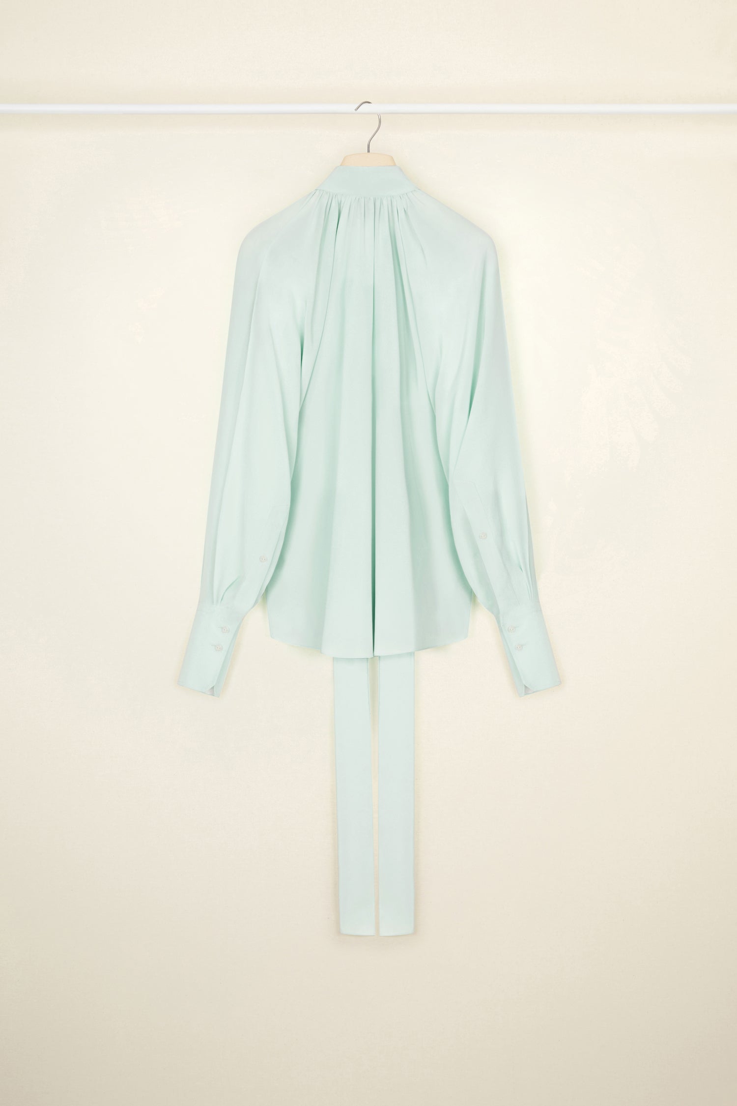 Patou - Silk lavallière blouse - Water Green - Daily glow, wrapped in a Patou bow. Green Waterfall silk crepe blouse. Lavallière collar with long ties at the front. Pleating at the front and back to create draping, Button fastening with JP engraved buttons. Buttoned cuffs.