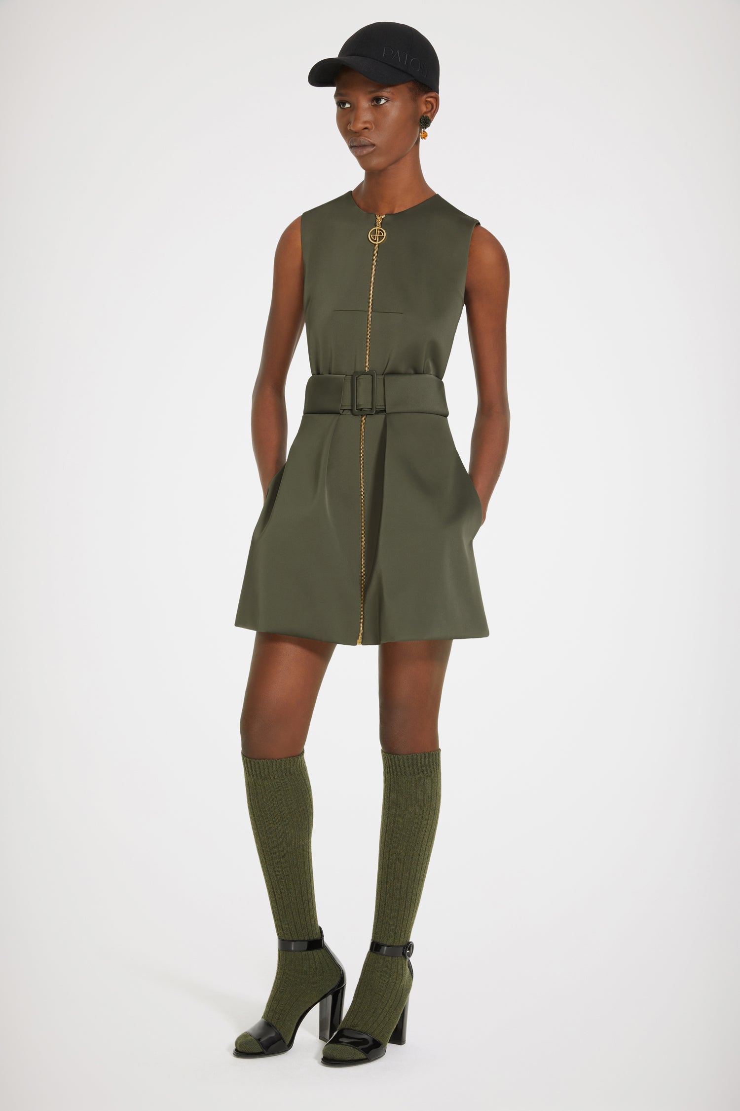 Patou - Zip-up mini dress in recycled satin - Khaki Green - A JP zipper makes everything shinier!Khaki recycled satin dress. Short hemline. Fit and flare silhouette. Full-length gold-tone zip with JP puller inspired by a heritage keyring from the Jean Patou archive. Signature curved seam at the back. Partly concealed fabric belt with adjustable buckle.