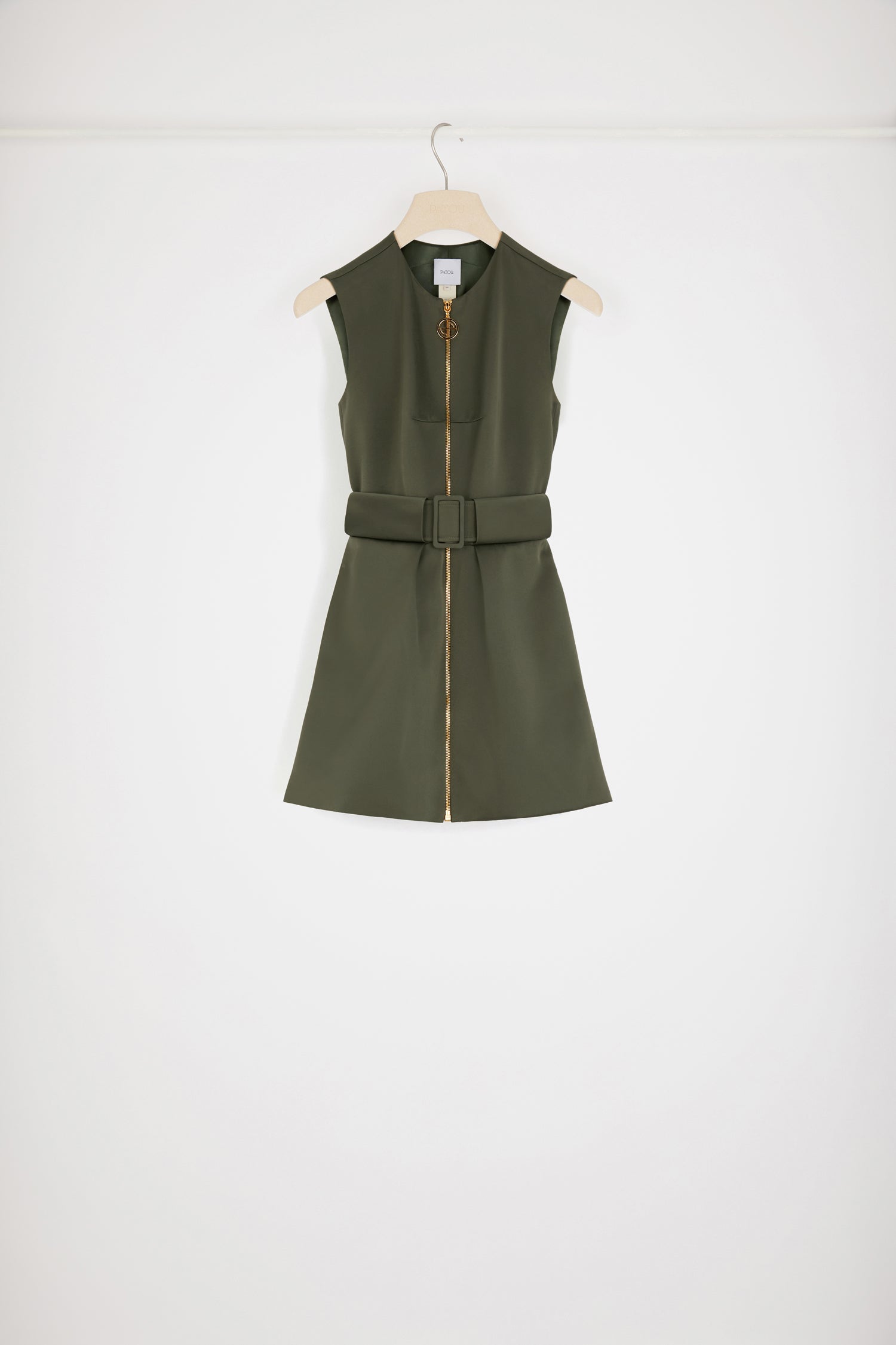 Patou - Zip-up mini dress in recycled satin - Khaki Green - A JP zipper makes everything shinier!Khaki recycled satin dress. Short hemline. Fit and flare silhouette. Full-length gold-tone zip with JP puller inspired by a heritage keyring from the Jean Patou archive. Signature curved seam at the back. Partly concealed fabric belt with adjustable buckle.