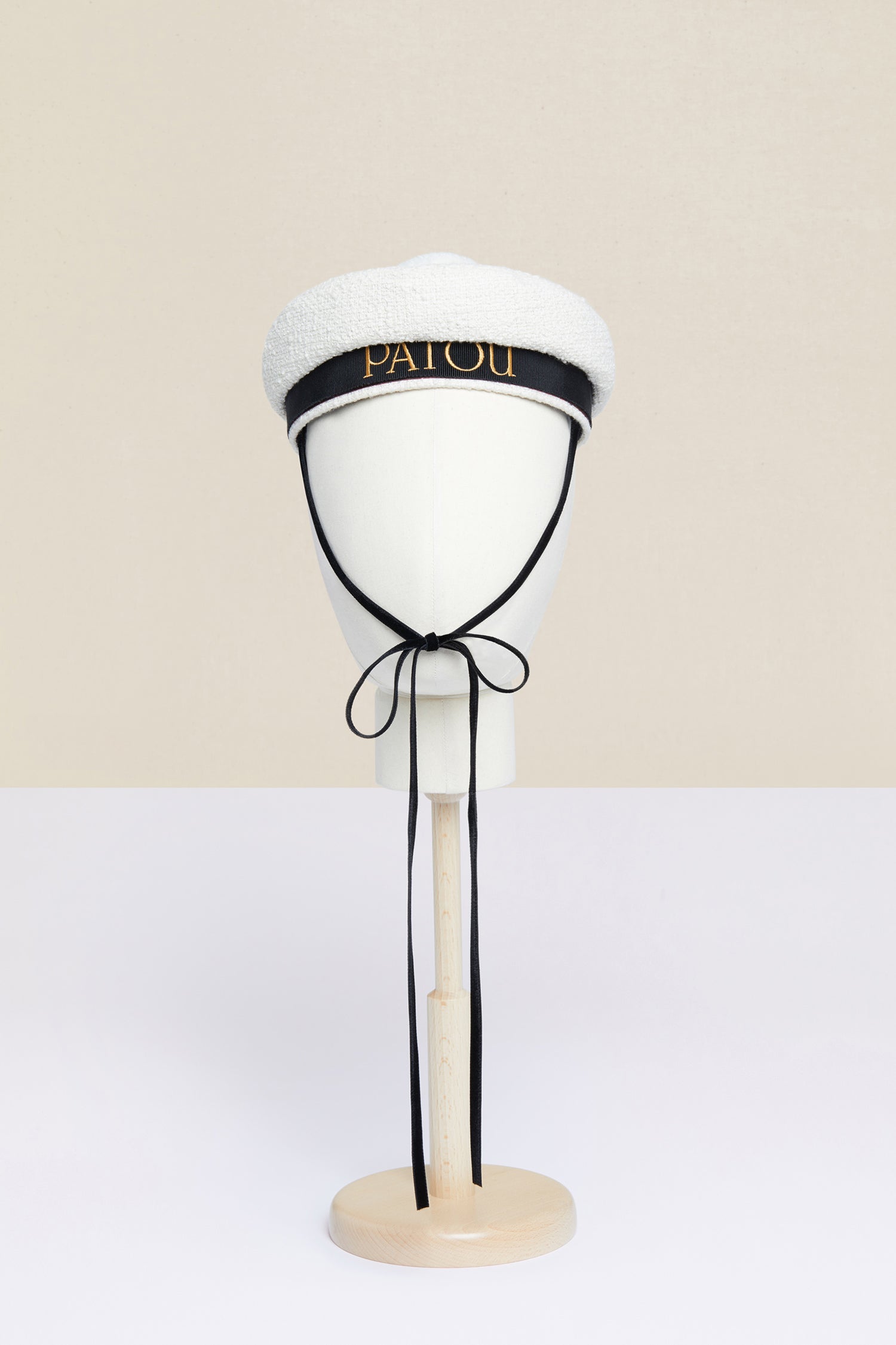 Patou - Tweed sailor hat - Sand - With a pompom on top!Patou’s take on the traditional sailor hat, crafted from sand white cotton tweed. Contrasting black grosgrain base with lettering logo embroidered in gold letters. Fastens via black velvet ties. Topped off with a detachable white pompom.