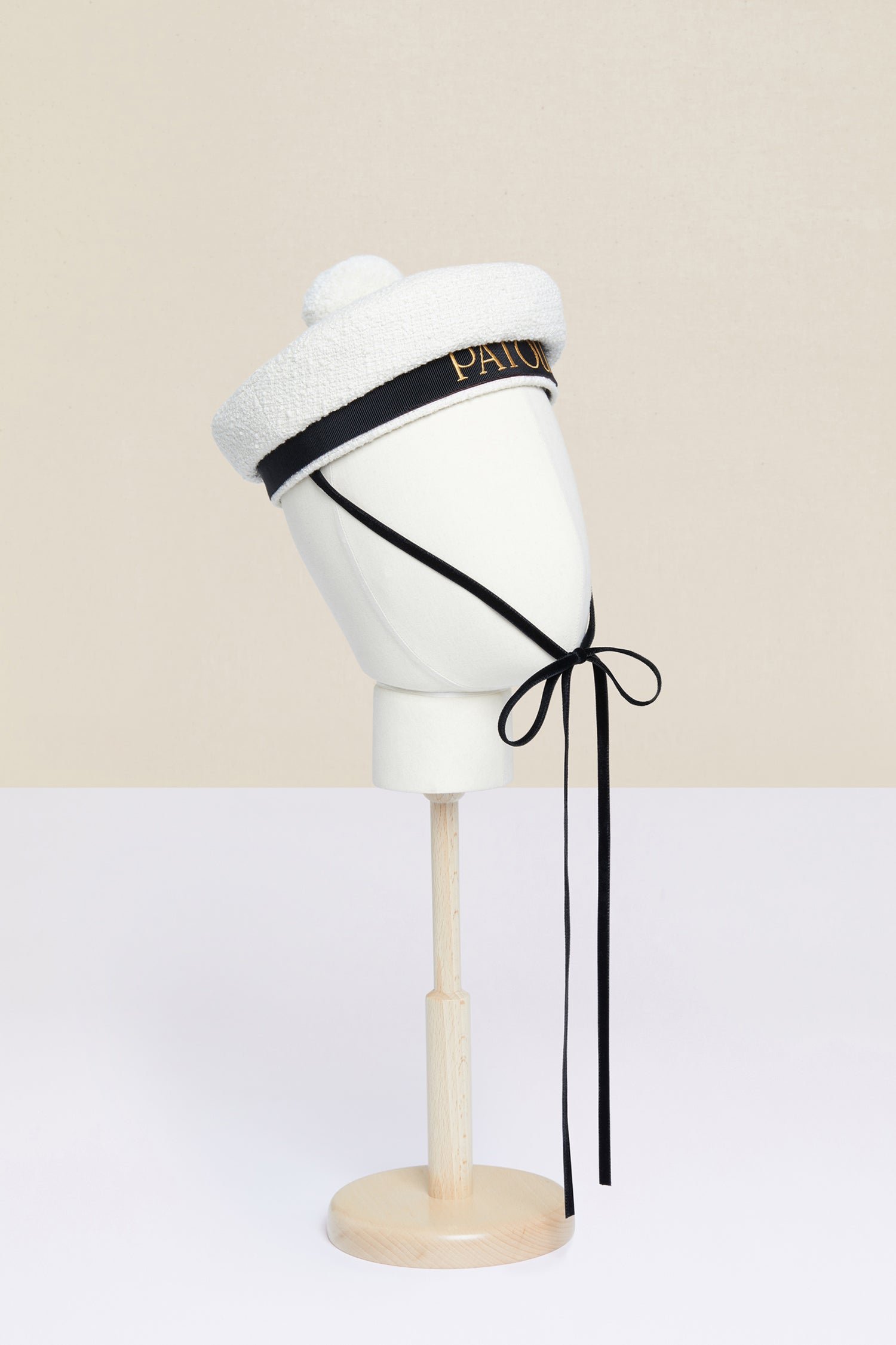 Patou - Tweed sailor hat - Sand - With a pompom on top!Patou’s take on the traditional sailor hat, crafted from sand white cotton tweed. Contrasting black grosgrain base with lettering logo embroidered in gold letters. Fastens via black velvet ties. Topped off with a detachable white pompom.