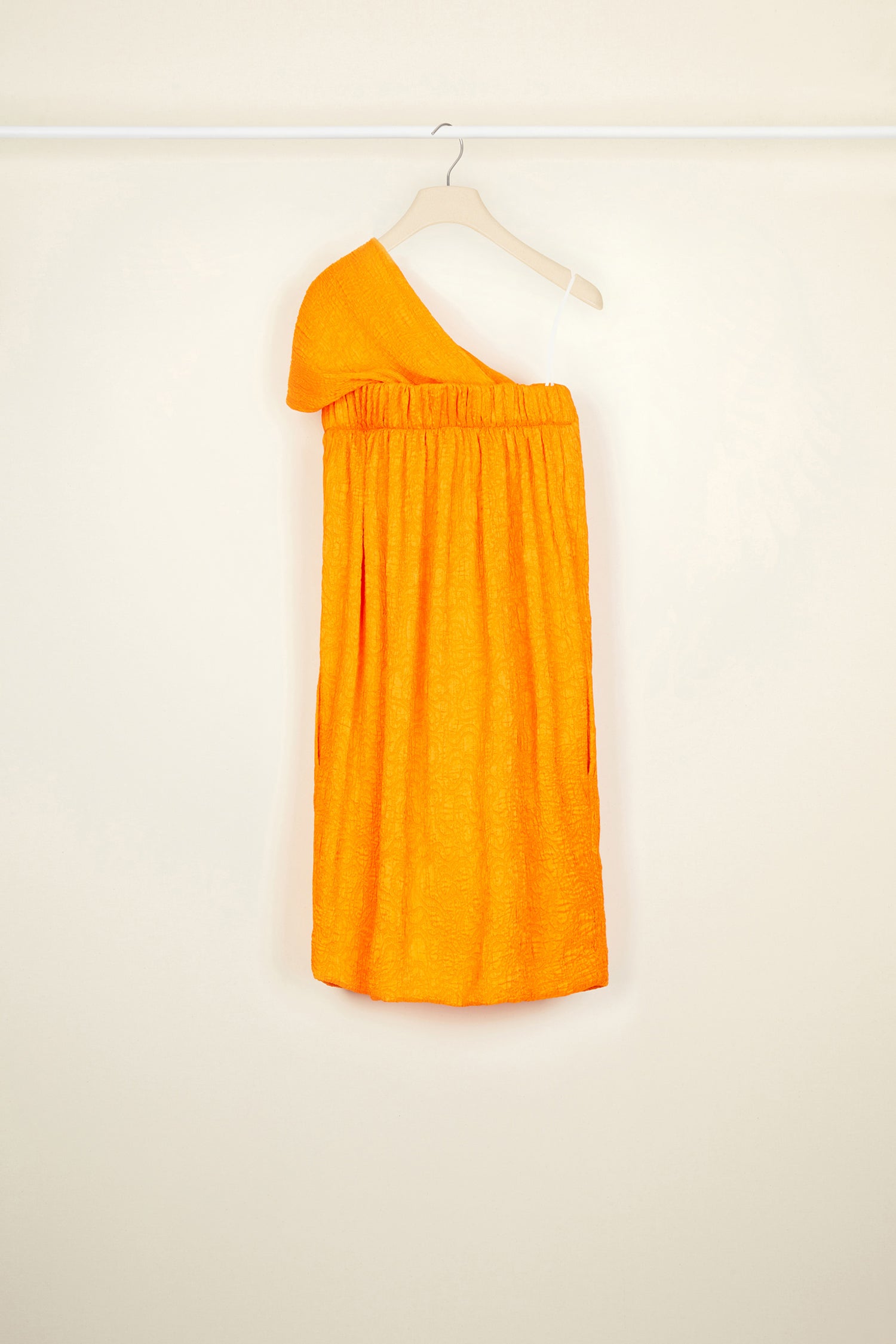 Patou - One-shoulder cloqué dress - Tangerine - Evening alternates.Tangerine eco-conscious cloqué viscose dress. Elasticated strapless style with an asymmetrical neckline that drapes around the shoulder. Concealed zip at the side.