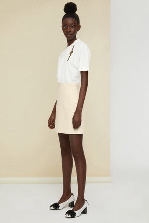 Décolleté in tweed con perle