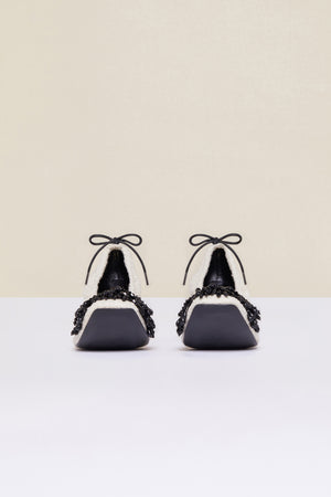 Décolleté in tweed con perle