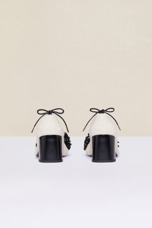 Décolleté in tweed con perle