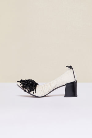 Décolleté in tweed con perle