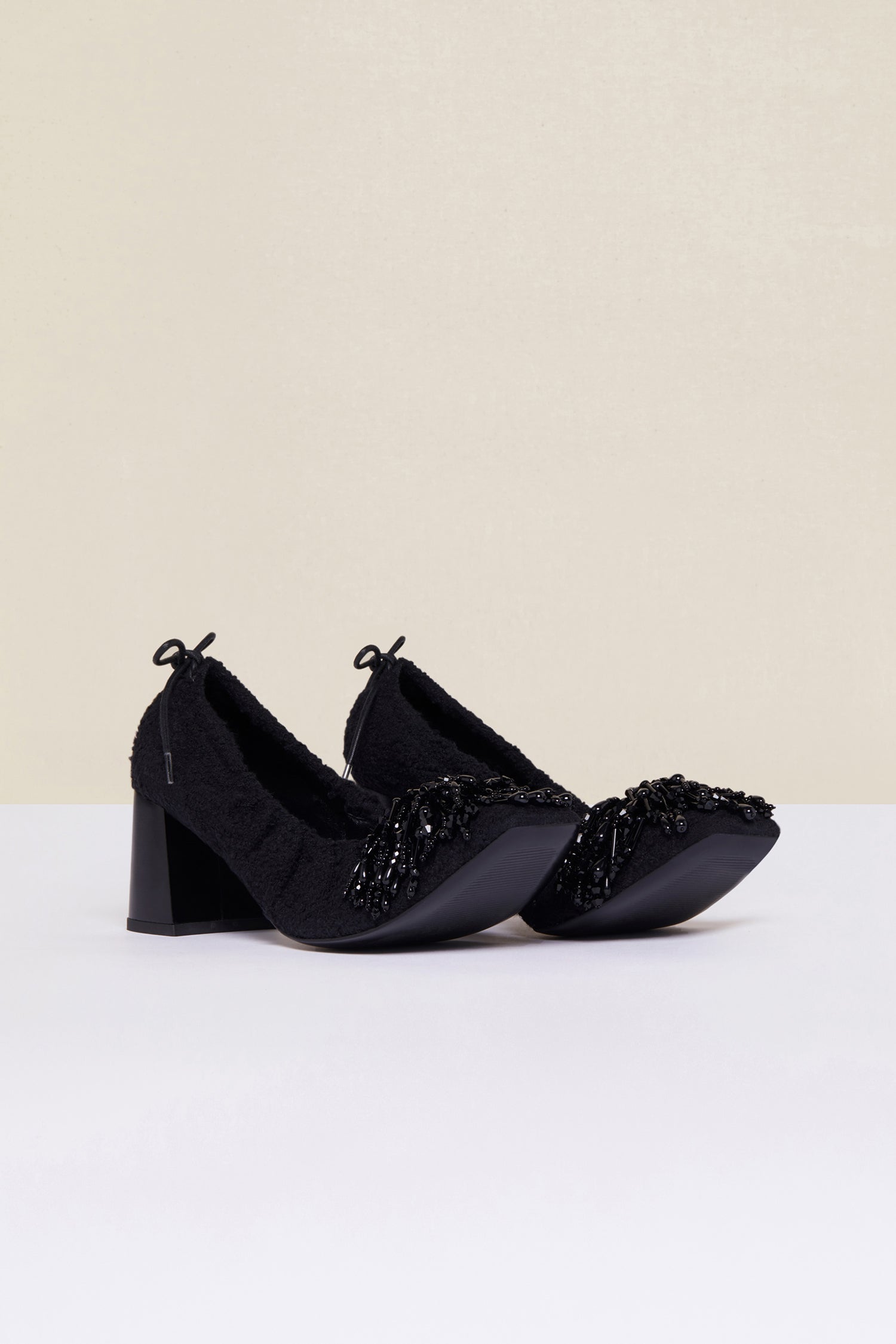 Patou - Pearl-embellished tweed pumps - Black - Summer tweed with a side of pearls.Drawstring pumps crafted from black cotton tweed. Black pearl pompom embellishment. Square toe. Black ties that fasten at the back. Block heel.
