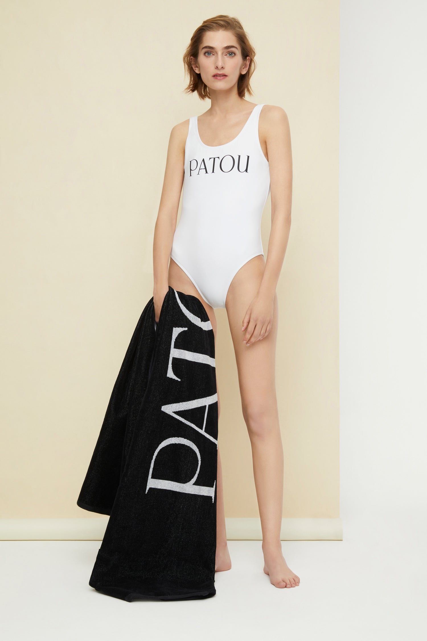 Patou - Costume intero con schiena scoperta - White - Al mare con Patou!Costume da bagno intero bianco. Scollo tondo, schiena scoperta. Logo Patou in lettere nere sul fronte.