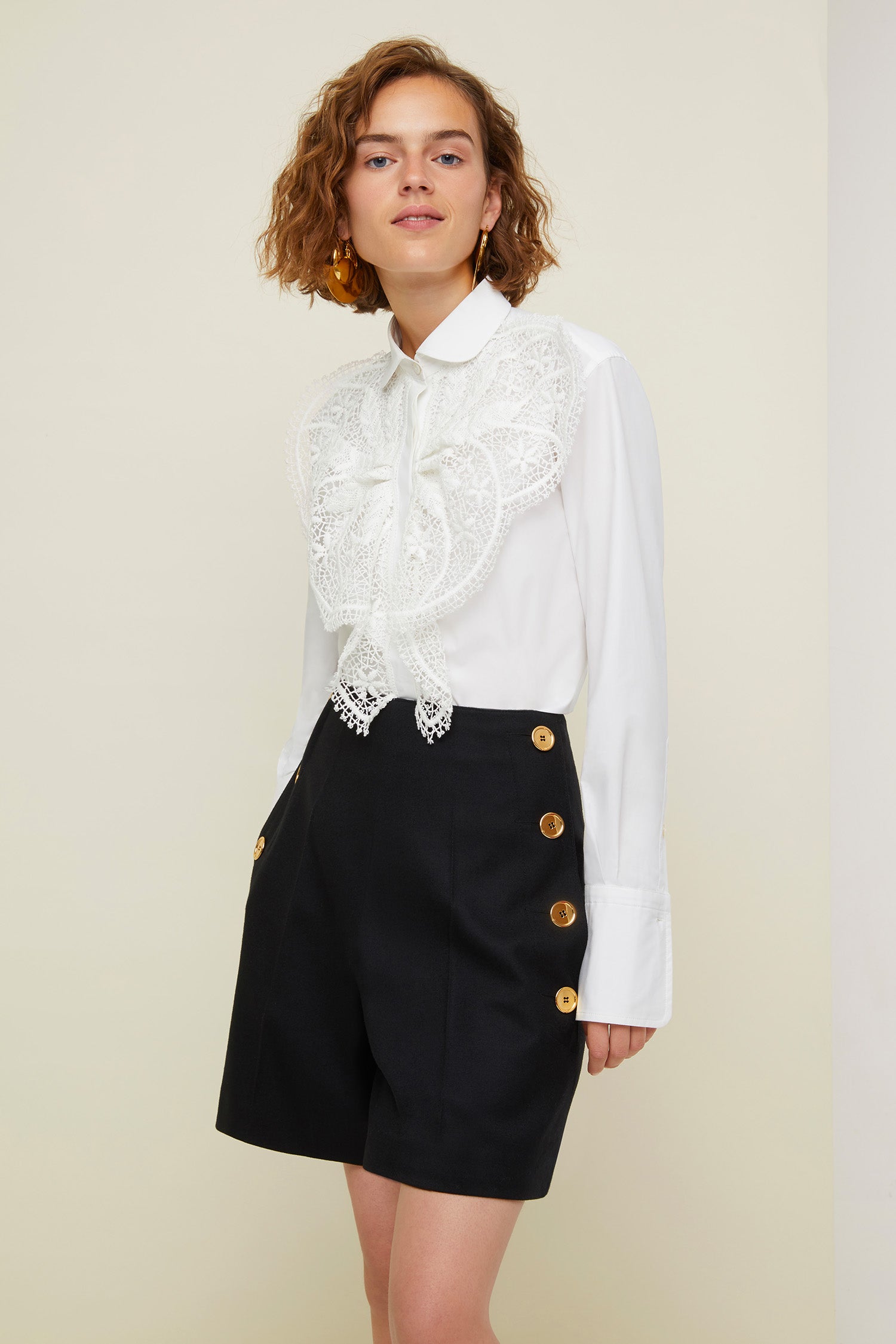 Patou - Lace bib shirt - White - The sheer seduction of guipure lace.White cotton poplin shirt with white floral lace bib at the front. Classic shirt collar and concealed button fastening. Buttoned cuffs.