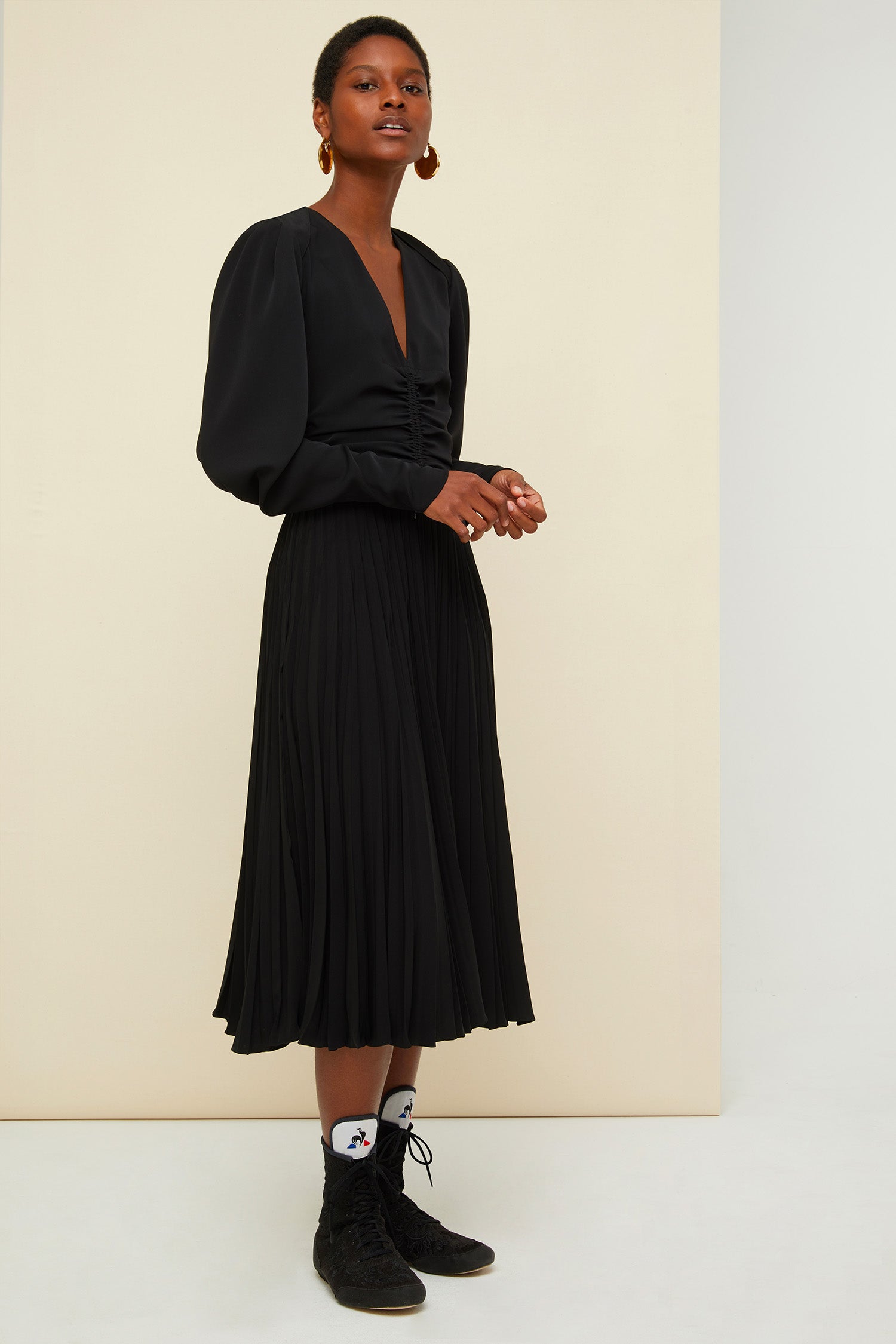 Patou - Twisted collar pleated dress - Black - Twists and turns and pleats.  Black cady midi dress. Deep V neckline, twisted cut-out collar at the back. Shirred detailing at the front. Long dolman sleeves with shirred elbows and zipped cuffs. Fully lined.