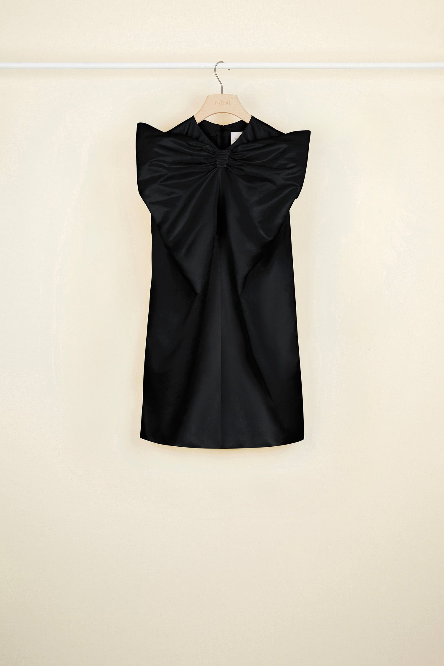 Patou - Oversized bow satin mini dress - Black - Charming and dramatic: the oversized satin bow.  Black duchesse satin mini dress. Oversized bow at the front. Zip fastening at the back. Fully lined.