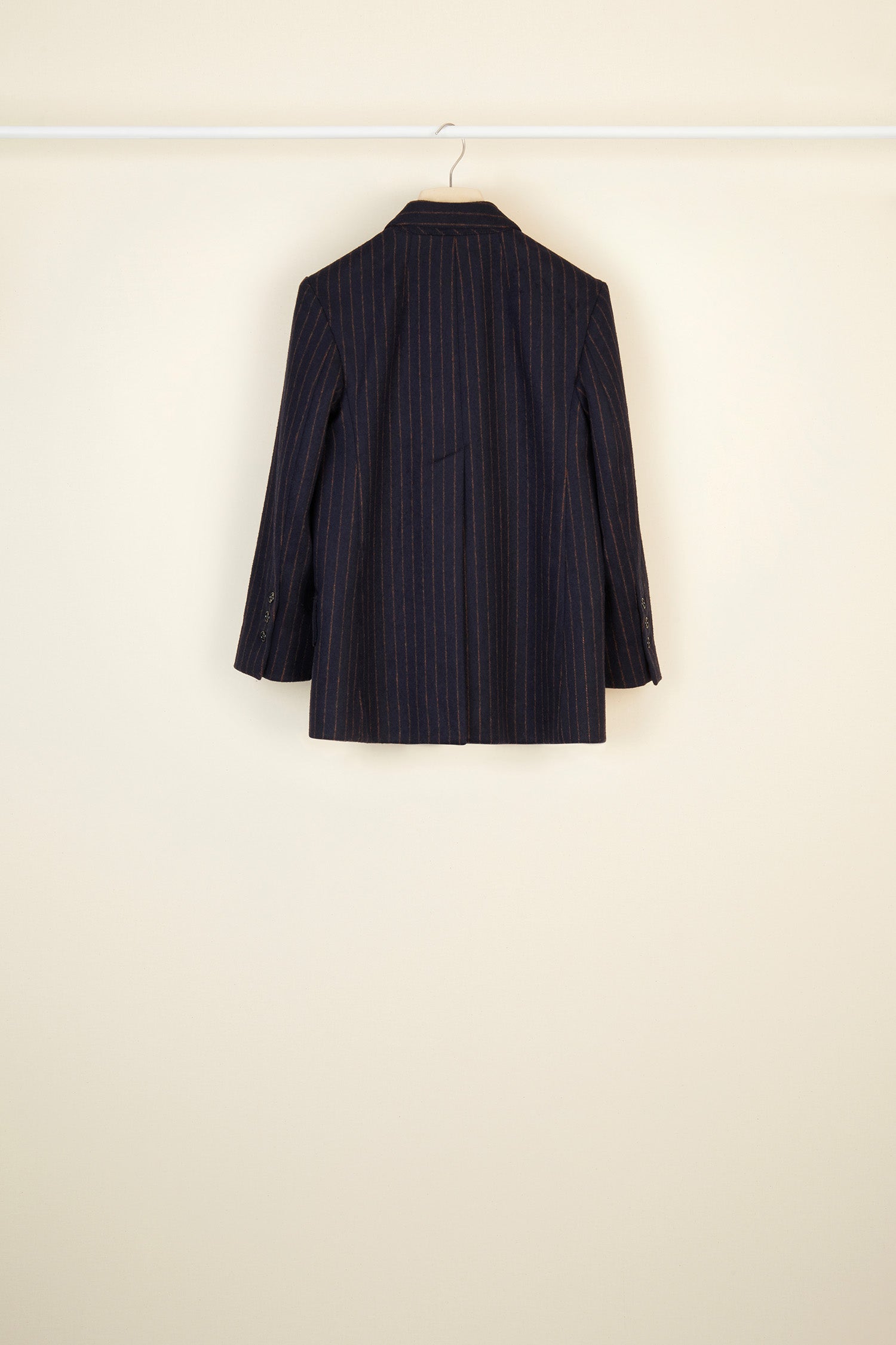 Patou - Double-breasted chalk stripe wool jacket - Navy Sienna - The allure of stripes.  Double-breasted navy and burnt sienna chalk stripe wool jacket. Buttons at the front and on the cuffs. Tailor-style Patou label on the sleeve. Two flap pockets at the front, one internal pocket. Single high vent at the back with button fastening. Fully lined. Brooches sold separately.