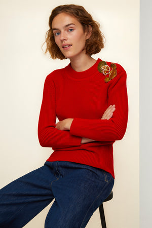 Maglione in lana merino con spille